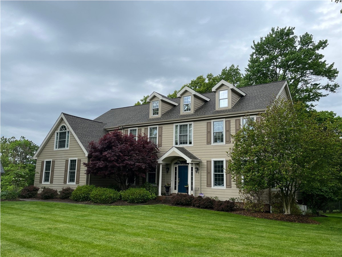 Completed exterior remodel, two-story home