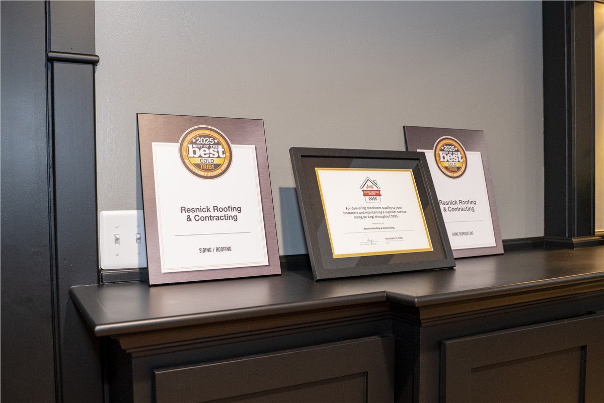 Resnick Roofing awards displayed on a shelf