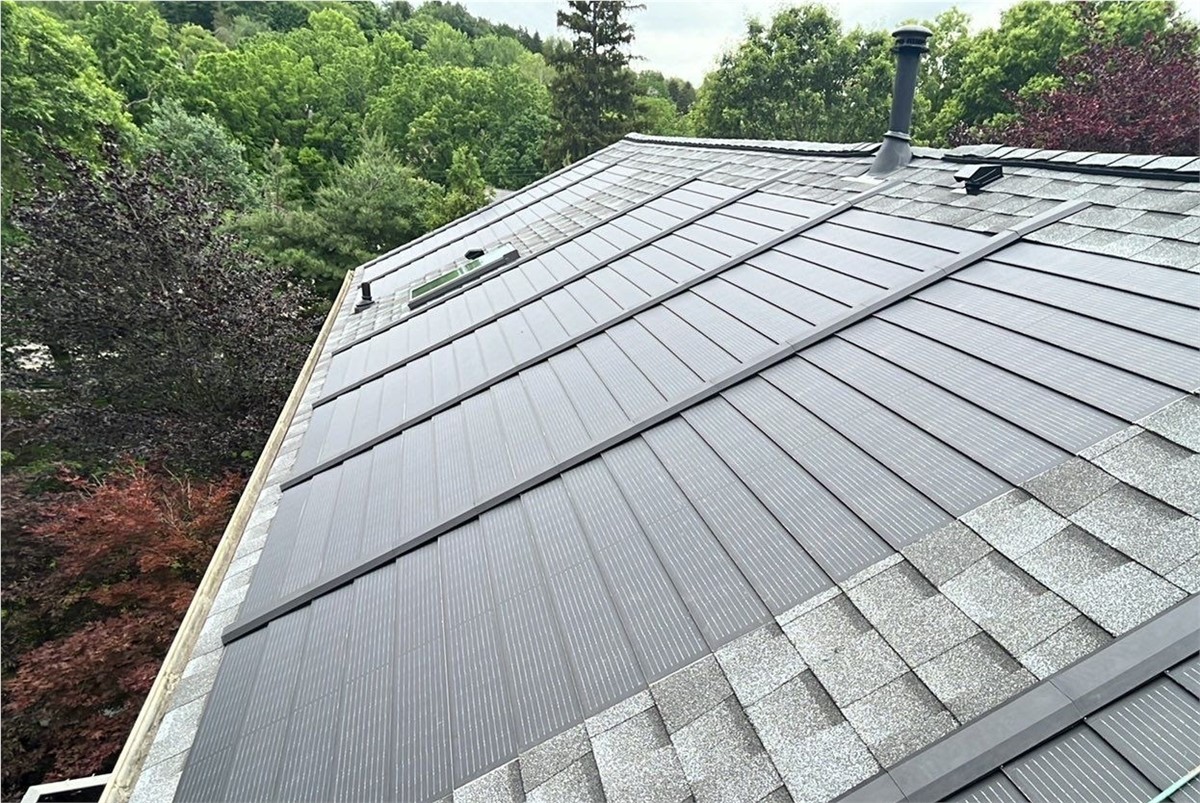 Completed solar shingle roof, aerial view