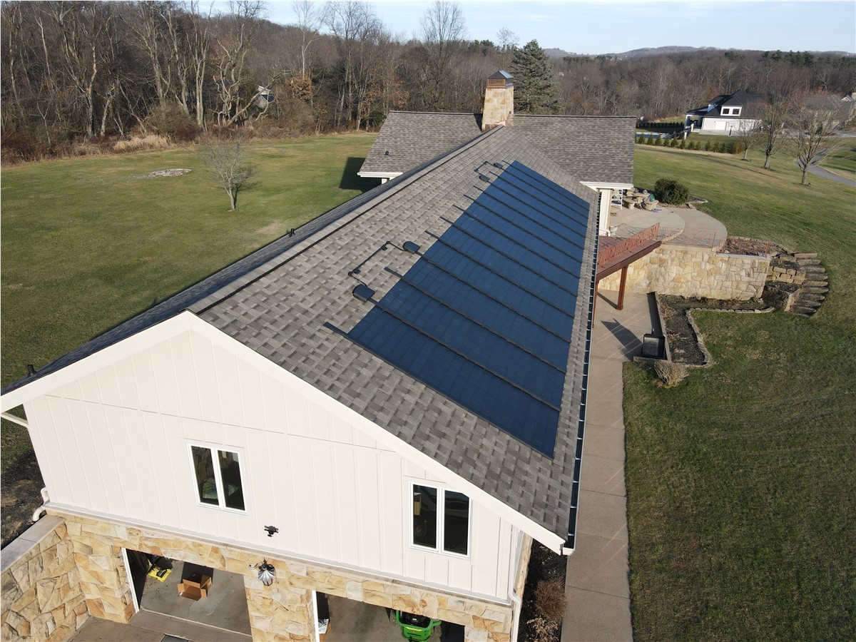 Aerial view of a completed solar roofing install